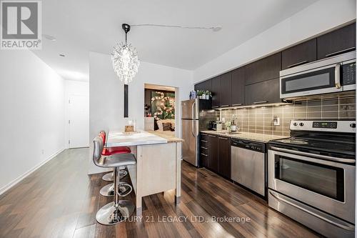 106 - 38 Joe Shuster Way, Toronto, ON - Indoor Photo Showing Kitchen With Stainless Steel Kitchen