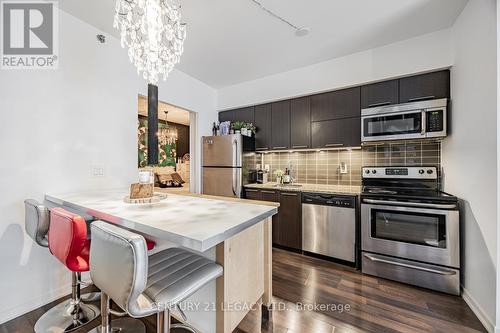 106 - 38 Joe Shuster Way, Toronto, ON - Indoor Photo Showing Kitchen With Stainless Steel Kitchen