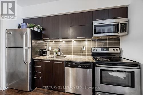 106 - 38 Joe Shuster Way, Toronto, ON - Indoor Photo Showing Kitchen With Stainless Steel Kitchen With Upgraded Kitchen