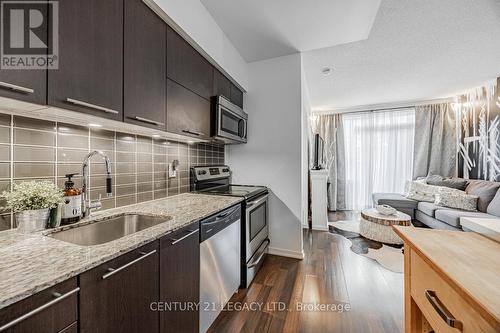 106 - 38 Joe Shuster Way, Toronto, ON - Indoor Photo Showing Kitchen With Stainless Steel Kitchen With Upgraded Kitchen