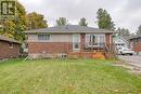 View of front facade featuring a front yard and cooling unit - 824 Devonshire Avenue, Woodstock, ON  - Outdoor With Deck Patio Veranda 