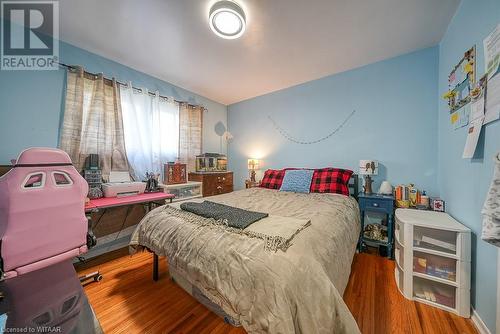 Bedroom featuring hardwood / wood-style floors - 824 Devonshire Avenue, Woodstock, ON - Indoor Photo Showing Bedroom