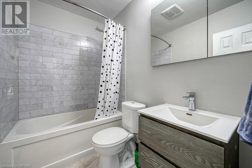 Full bathroom with vanity, shower / bath combo, and toilet - 824 Devonshire Avenue, Woodstock, ON - Indoor Photo Showing Bathroom