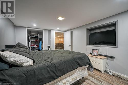 Bedroom with a closet, a spacious closet, and light wood-type flooring - 824 Devonshire Avenue, Woodstock, ON - Indoor Photo Showing Bedroom