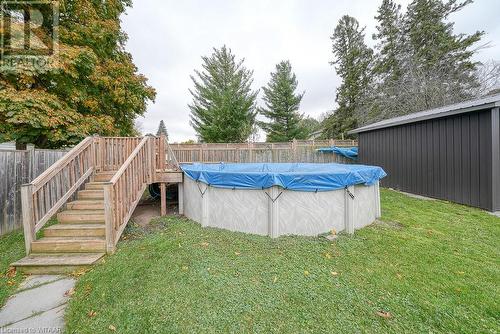 View of pool with a lawn - 824 Devonshire Avenue, Woodstock, ON - Outdoor With Above Ground Pool With Backyard