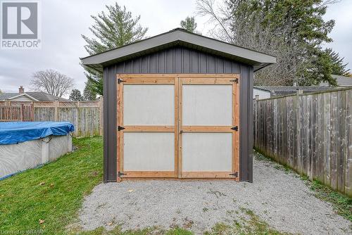 View of outbuilding featuring a covered pool - 824 Devonshire Avenue, Woodstock, ON - Outdoor With Exterior