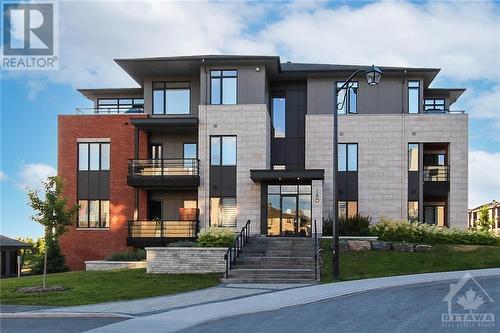 Exterior - 180 Boundstone Way Unit#203, Ottawa, ON - Outdoor With Balcony With Facade