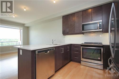 180 Boundstone Way Unit#203, Ottawa, ON - Indoor Photo Showing Kitchen With Stainless Steel Kitchen With Upgraded Kitchen