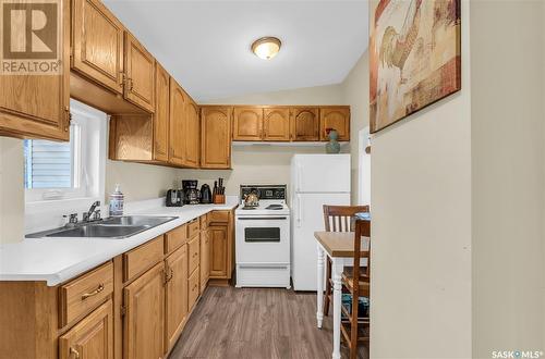 823 G Avenue N, Saskatoon, SK - Indoor Photo Showing Kitchen With Double Sink