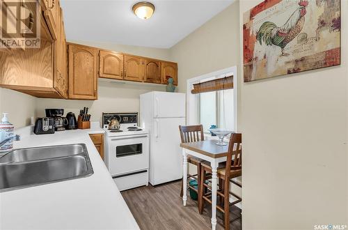 823 G Avenue N, Saskatoon, SK - Indoor Photo Showing Kitchen With Double Sink