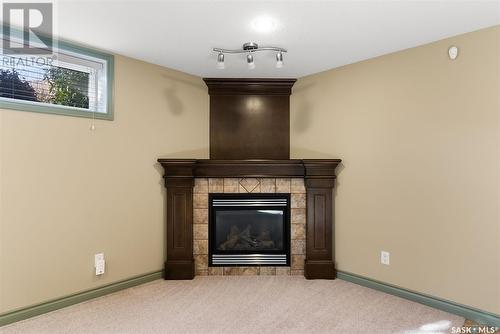 1902 Laurier Crescent E, Regina, SK - Indoor Photo Showing Living Room With Fireplace