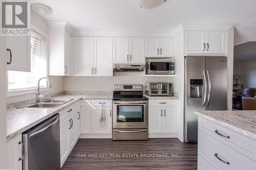 11 Beech Boulevard, Tillsonburg, ON - Indoor Photo Showing Kitchen With Double Sink