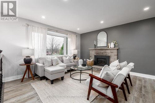 Upper - 997 Hatfield Crescent, Peterborough, ON - Indoor Photo Showing Living Room With Fireplace