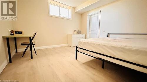 Bedroom featuring light hardwood / wood-style flooring - 783 Autumn Willow Drive Unit# Lower, Waterloo, ON - Indoor Photo Showing Bedroom