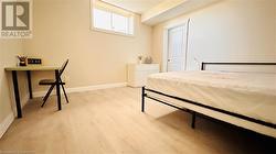 Bedroom featuring light hardwood / wood-style flooring - 