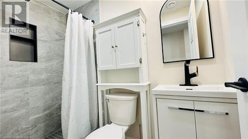 Bathroom with toilet, a shower with curtain, and vanity - 783 Autumn Willow Drive Unit# Lower, Waterloo, ON - Indoor Photo Showing Bathroom