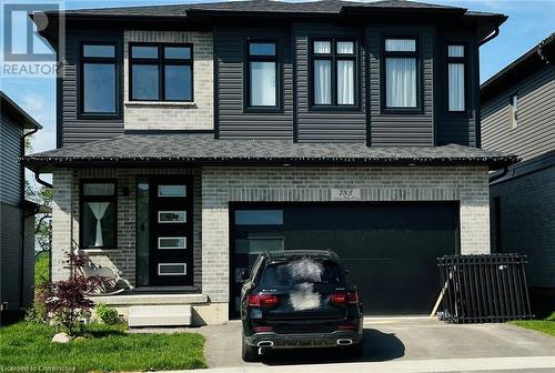 View of front facade with a garage - 783 Autumn Willow Drive Unit# Lower, Waterloo, ON - Outdoor With Facade