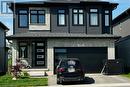 View of front facade with a garage - 783 Autumn Willow Drive Unit# Lower, Waterloo, ON  - Outdoor With Facade 