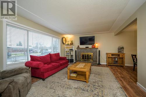 3032 1St Avenue, Prince George, BC - Indoor Photo Showing Living Room With Fireplace