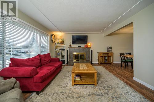 3032 1St Avenue, Prince George, BC - Indoor Photo Showing Living Room With Fireplace