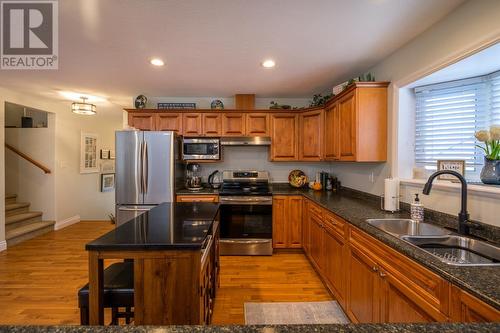 130 6807 Westgate Avenue, Prince George, BC - Indoor Photo Showing Kitchen With Double Sink