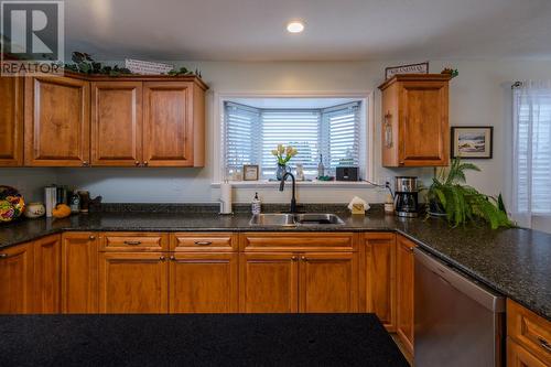 130 6807 Westgate Avenue, Prince George, BC - Indoor Photo Showing Kitchen With Double Sink