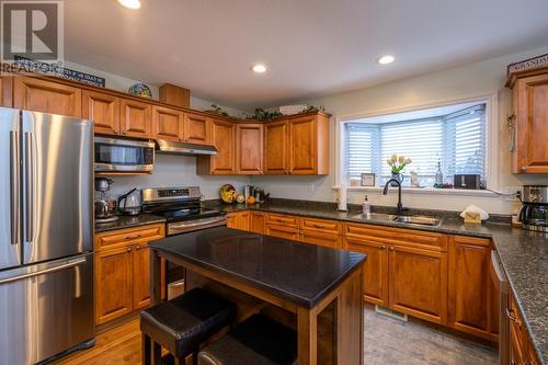 130 6807 Westgate Avenue, Prince George, BC - Indoor Photo Showing Kitchen With Double Sink