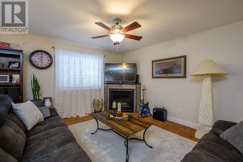 130 6807 Westgate Avenue, Prince George, BC - Indoor Photo Showing Living Room With Fireplace