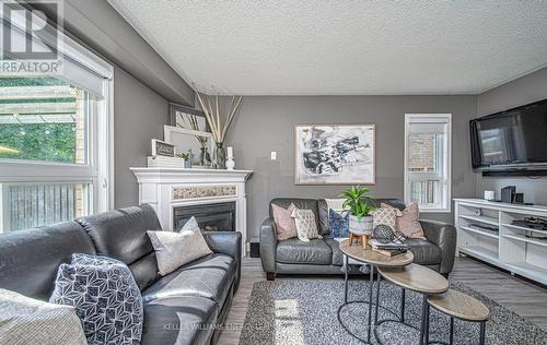 988 Southport Drive, Oshawa (Donevan), ON - Indoor Photo Showing Living Room With Fireplace