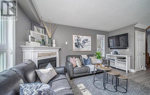 988 Southport Drive, Oshawa (Donevan), ON - Indoor Photo Showing Living Room With Fireplace