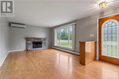 4447 Principale, Saint-Antoine, NB - Indoor Photo Showing Living Room With Fireplace