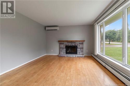 4447 Principale, Saint-Antoine, NB - Indoor Photo Showing Living Room With Fireplace