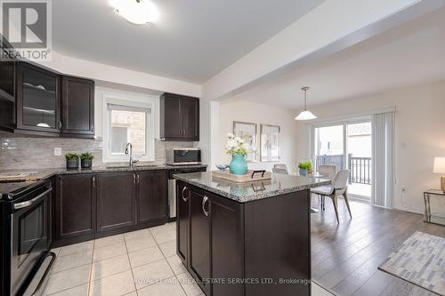 413 Switchgrass Street, Oakville, ON - Indoor Photo Showing Kitchen With Upgraded Kitchen