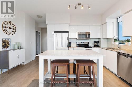 903 - 65 Speers Road, Oakville, ON - Indoor Photo Showing Kitchen With Stainless Steel Kitchen With Upgraded Kitchen