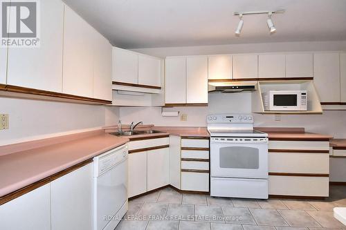 6 - 21 Paddock Wood, Peterborough (Ashburnham), ON - Indoor Photo Showing Kitchen With Double Sink