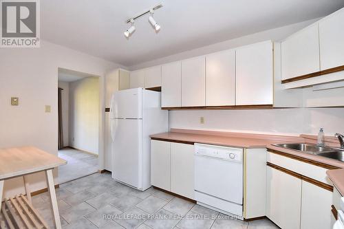 6 - 21 Paddock Wood, Peterborough (Ashburnham), ON - Indoor Photo Showing Kitchen With Double Sink