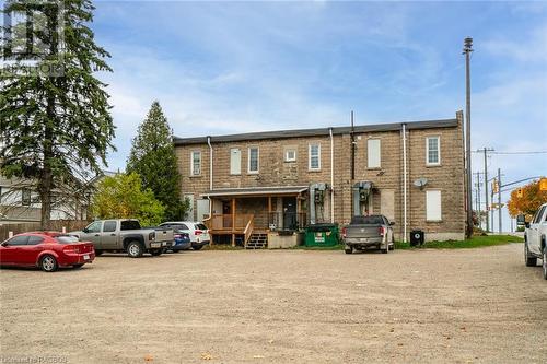 Rear view of property featuring covered porch - 3 Elora Street, Clifford, ON 