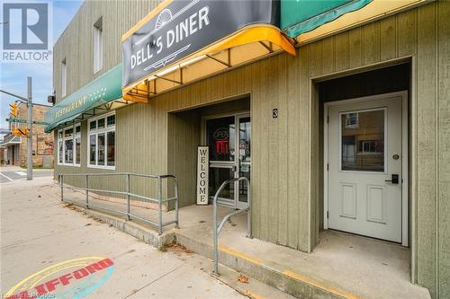 View of doorway to commercial unit and res units - 3 Elora Street, Clifford, ON 