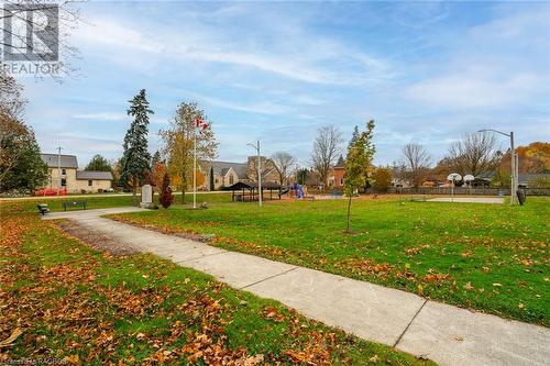 View of property's community featuring a playground and a yard - 3 Elora Street, Clifford, ON 