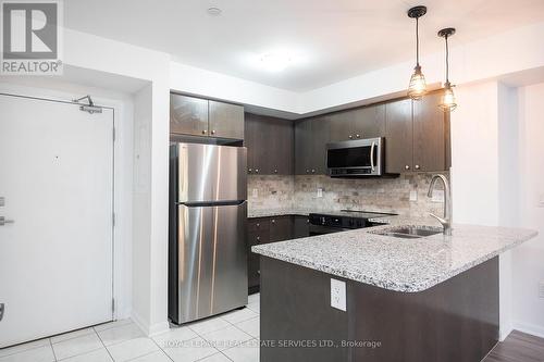 111 - 1045 Nadalin Heights, Milton, ON - Indoor Photo Showing Kitchen With Double Sink With Upgraded Kitchen