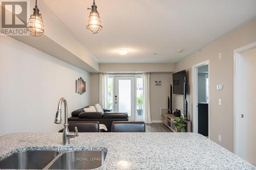 111 - 1045 Nadalin Heights, Milton, ON - Indoor Photo Showing Kitchen With Double Sink