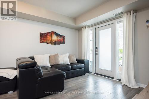 111 - 1045 Nadalin Heights, Milton, ON - Indoor Photo Showing Living Room