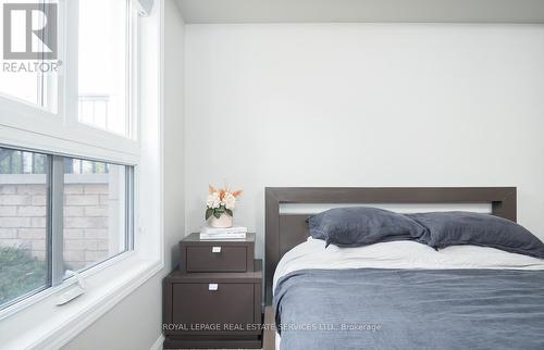 111 - 1045 Nadalin Heights, Milton, ON - Indoor Photo Showing Bedroom