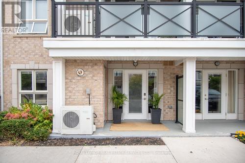 111 - 1045 Nadalin Heights, Milton, ON - Outdoor