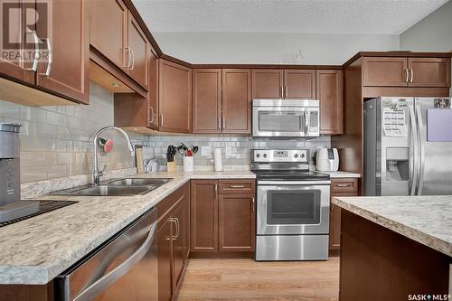 31 115 Veltkamp Crescent, Saskatoon, SK - Indoor Photo Showing Kitchen With Stainless Steel Kitchen With Double Sink