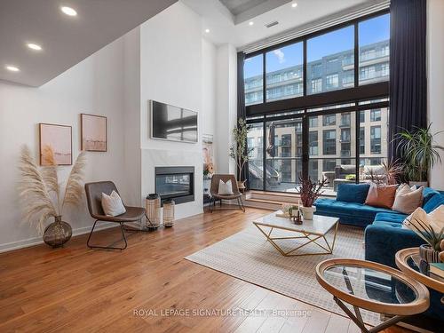 Ph2-533 Richmond St W, Toronto, ON - Indoor Photo Showing Living Room With Fireplace