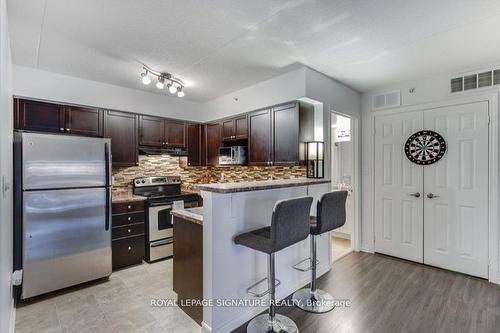 208-1340 Main St E, Milton, ON - Indoor Photo Showing Kitchen With Upgraded Kitchen