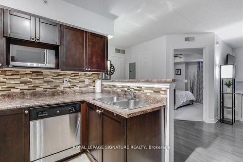 208-1340 Main St E, Milton, ON - Indoor Photo Showing Kitchen With Double Sink