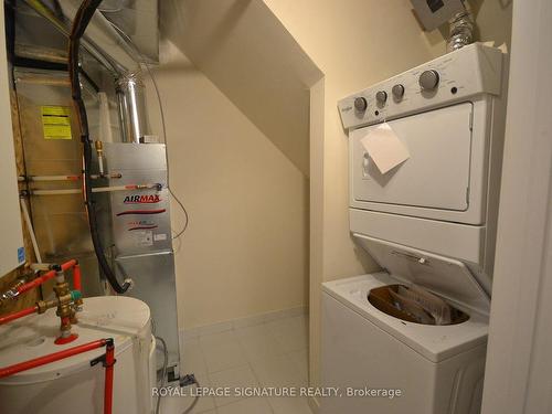 107-1573 Rose Way, Milton, ON - Indoor Photo Showing Laundry Room