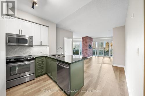 302 - 60 Absolute Avenue, Mississauga, ON - Indoor Photo Showing Kitchen With Stainless Steel Kitchen With Double Sink